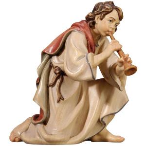 Pastore inginocchiato con flauto